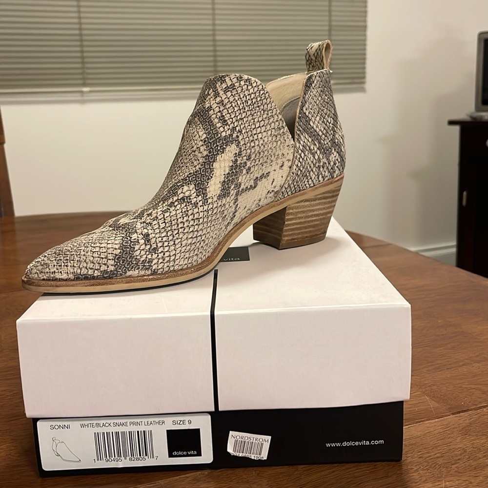 Snake print booties barely worn. Selling since my foot grew from running